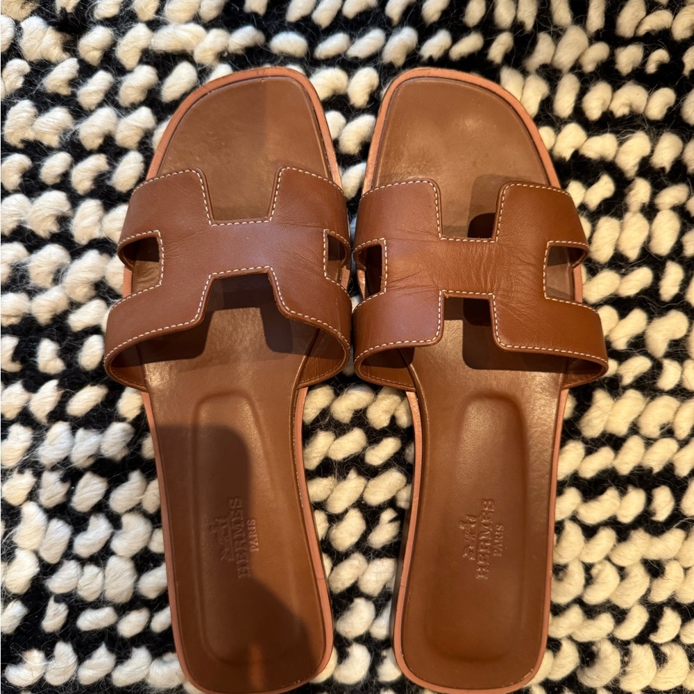 Hermes Oran sandals size 37. Soles are worn out; top of shoe in great condition